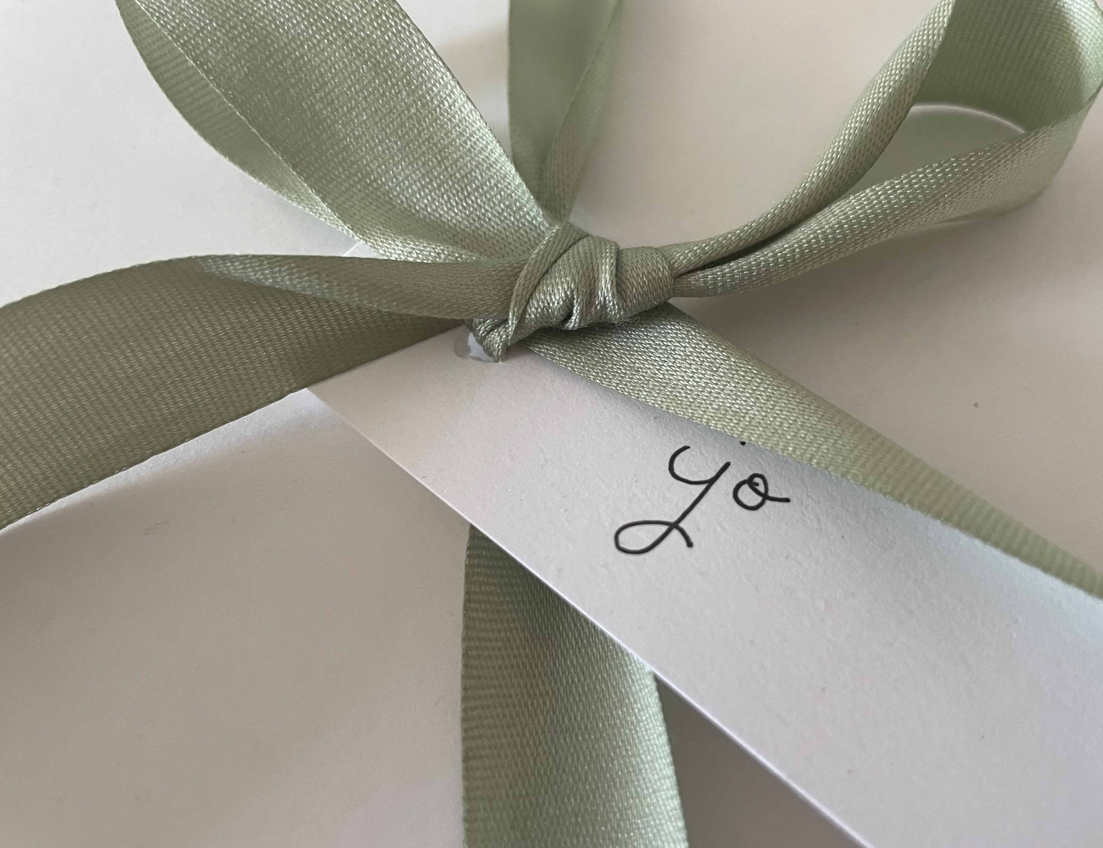 Green ribbon with white JO label